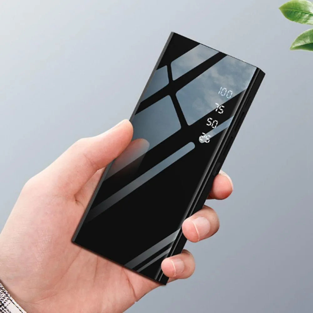 Black 20000mAh portable power bank with LCD screen and two USB ports