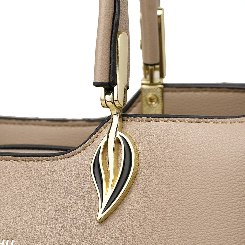 Women's multi-layer shoulder messenger bag in PU material showing compartment design