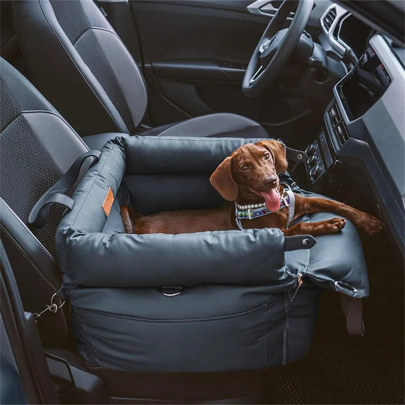 Green waterproof dog car nest bed with sides, showing removable design for washing, placed in a car boot.