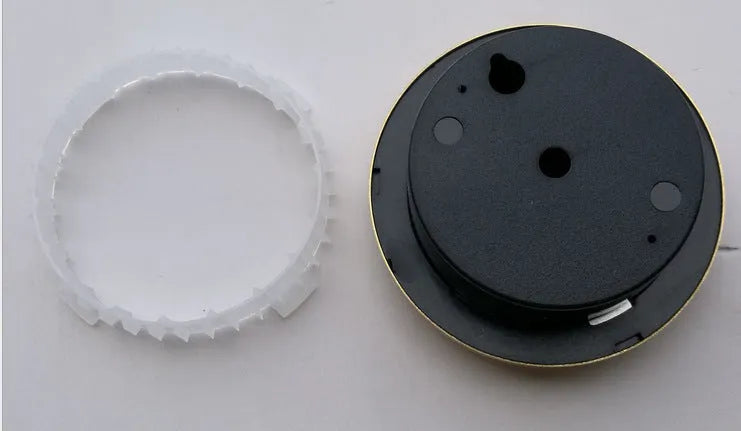 Silver aluminium analog thermometer and hygrometer on a white background.