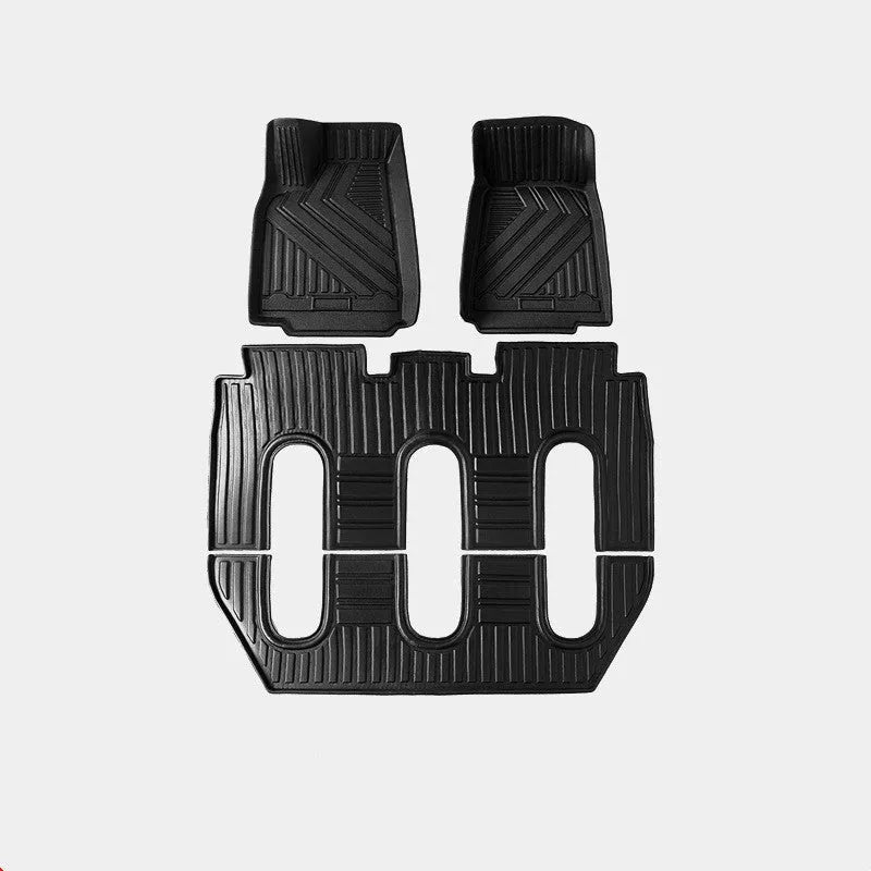 Tailored waterproof rubber car mats and boot liner for a Tesla Model X interior.