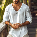 Beige long-sleeved V-neck slim fit t-shirt on a hanger.