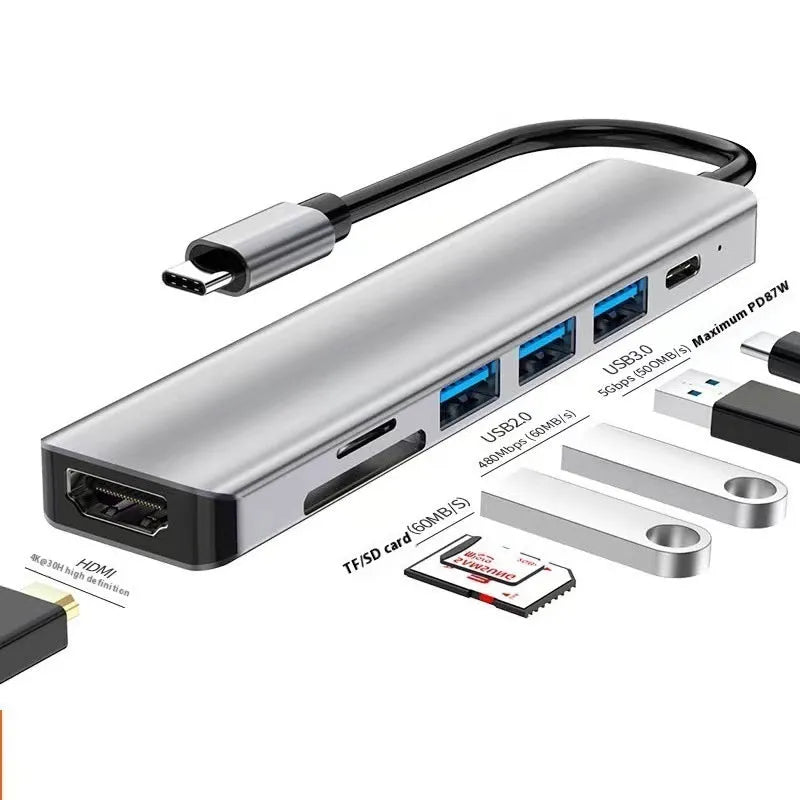 USB-C 7-in-1 expansion dock with HDMI port, multiple USB ports, and a 15cm black cable.