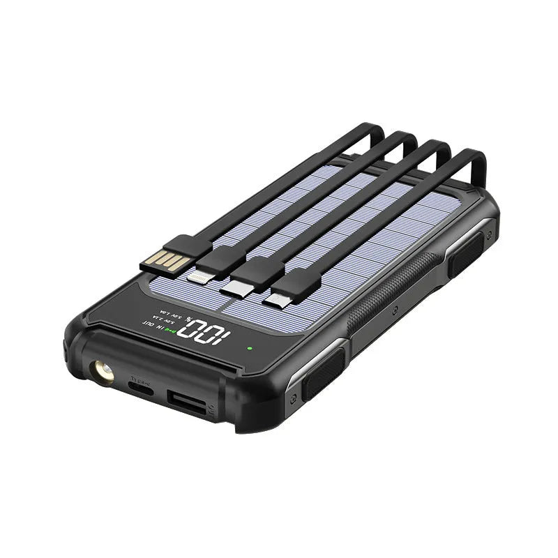 Black military-grade mobile power bank showing size next to a smartphone for scale.