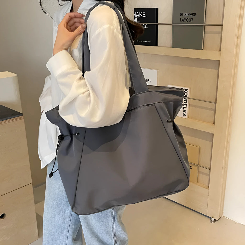 Soft foldable Oxford cloth tote bag in street trend style, shown in multiple colour options.