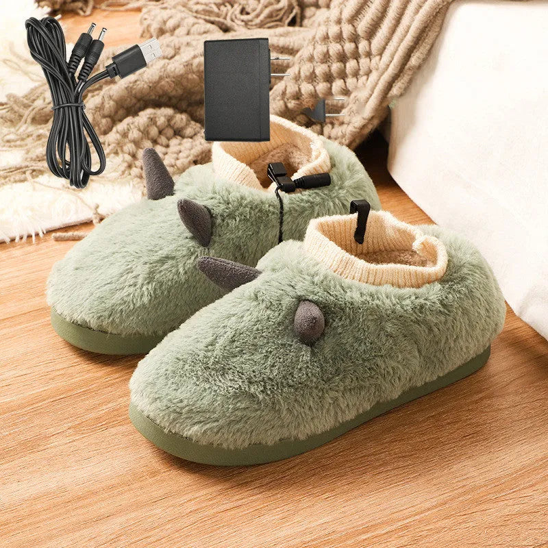 USB electric foot warmer slippers in grey with a connected USB cable on a wooden floor.