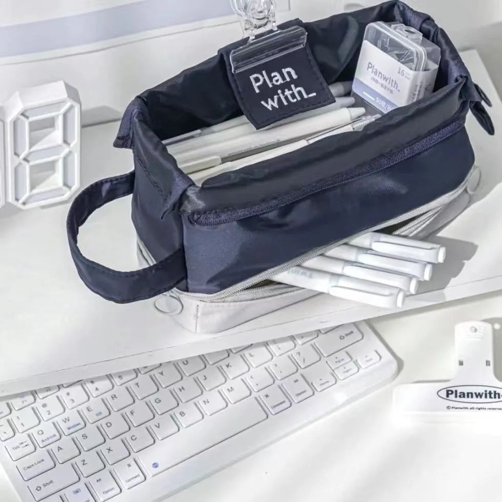 Folding double-layer student pencil case in dark blue, blue, and cream white colour options