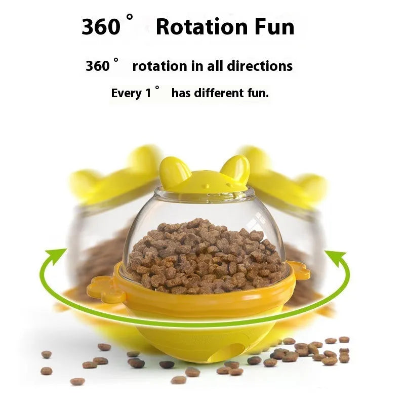 TPR dog puzzle feeder tumbler toy in blue and yellow colours, showing treat dispenser holes.