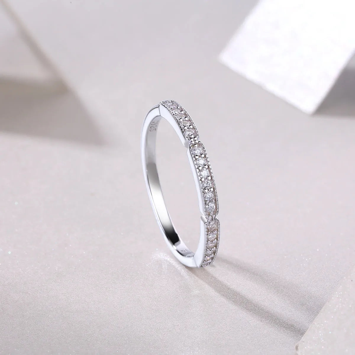 Moissanite wedding ring set in S925 silver with platinum plating, shown in golden, platinum, and rose gold finishes, sizes 5 to 9, with gift box and GRA certificate