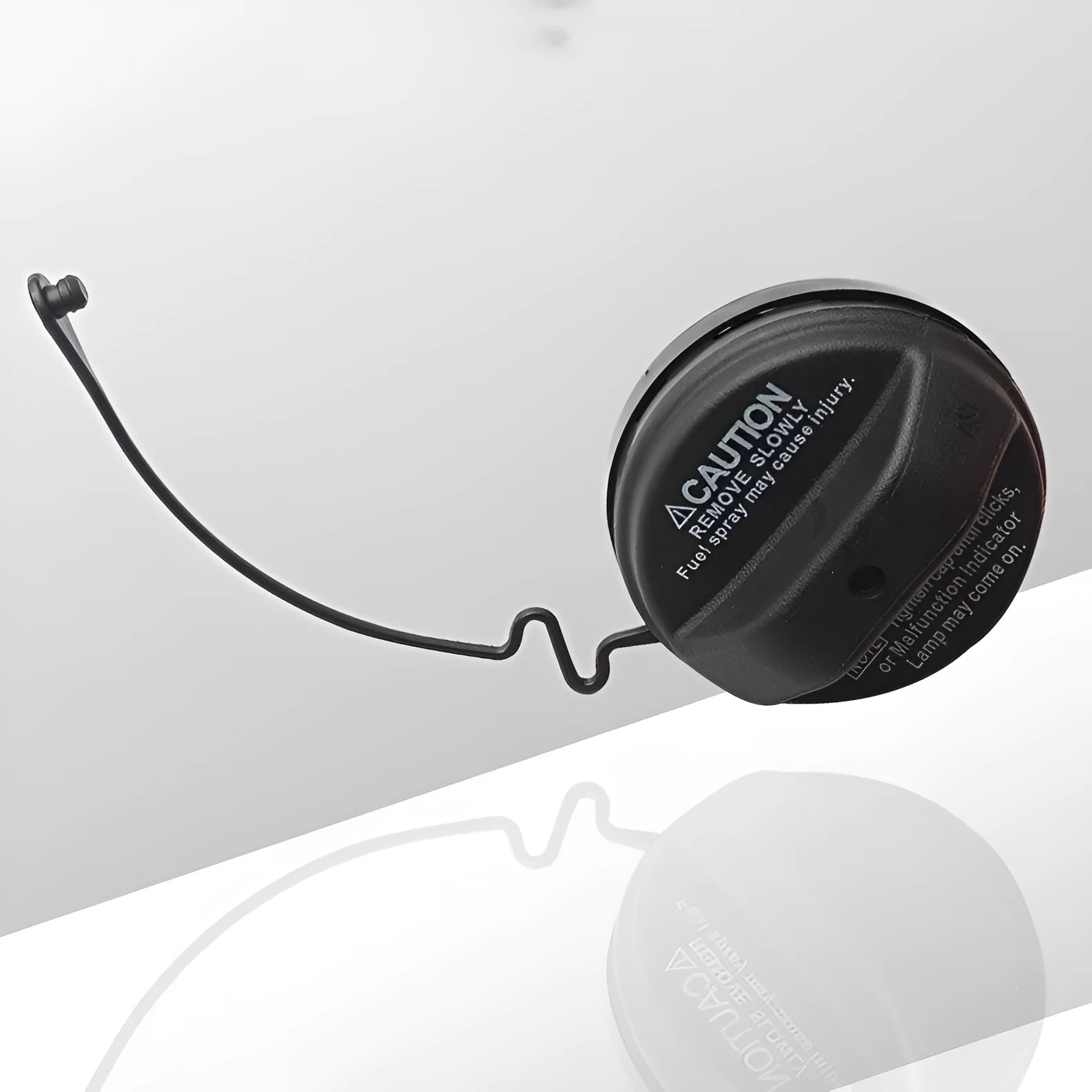 Black snap-on fuel tank cap for Toyota vehicle replacement.