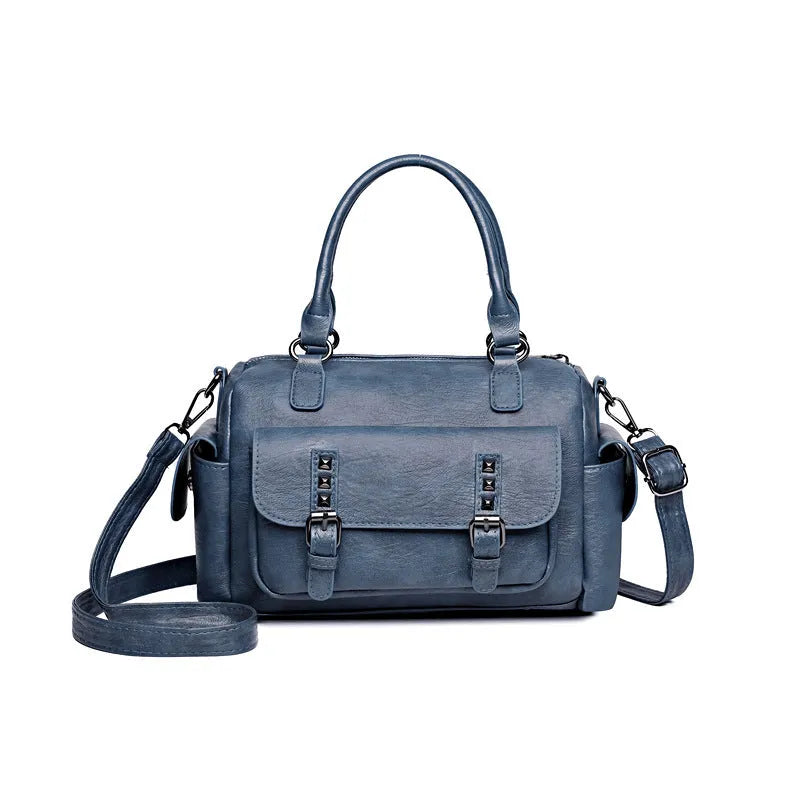 Vintage-style large capacity messenger bag in PU leather, showing contrast stitching and a horizontal square shape.