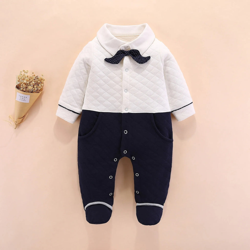 Baby boy British-style cotton onesie in navy blue with long sleeves and single-breasted front
