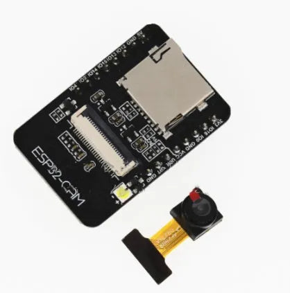 ESP32-CAM development board with OV2640 camera and WiFi Bluetooth module on a neutral background