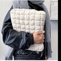 Black nylon laptop bag with cloud cotton padding shown open, sized for a 15.6 inch laptop