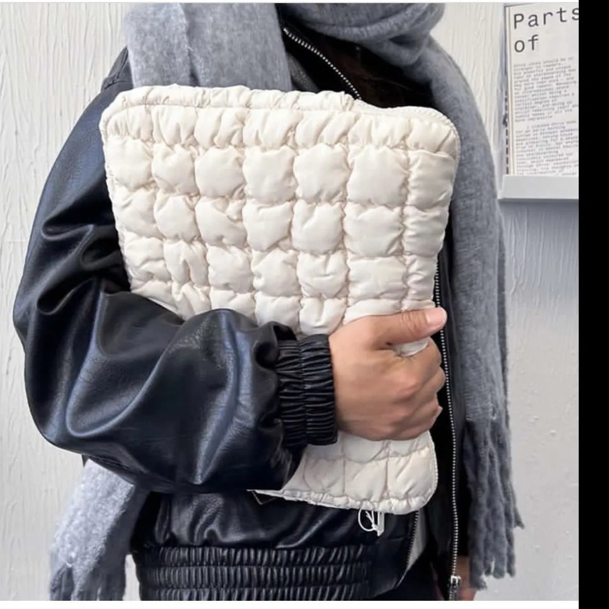 Black nylon laptop bag with cloud cotton padding shown open, sized for a 15.6 inch laptop