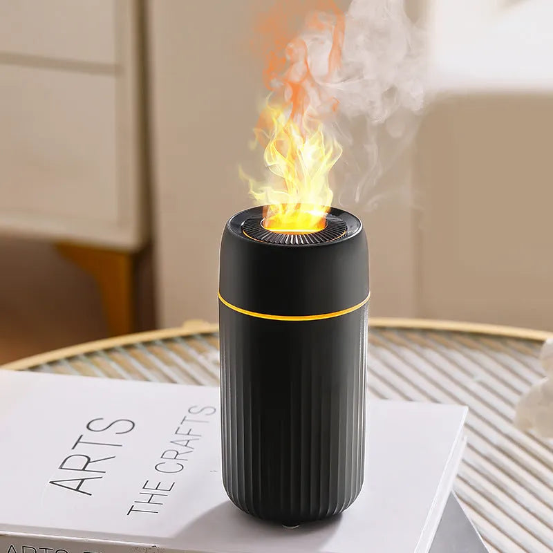 Car aroma diffuser with flame simulation effect showing black and white colour options