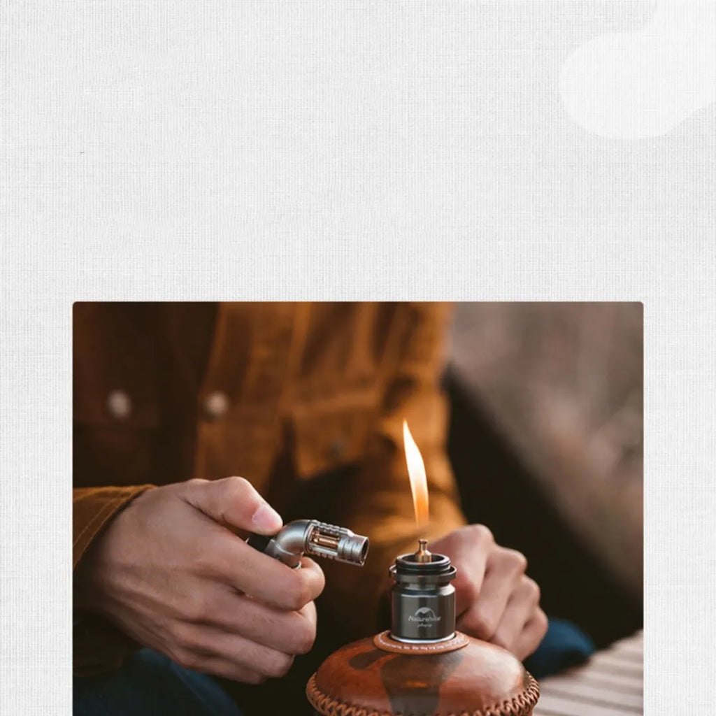 Portable gas cylinder light in silver, aluminum build, 120x50x50mm size, on outdoor background