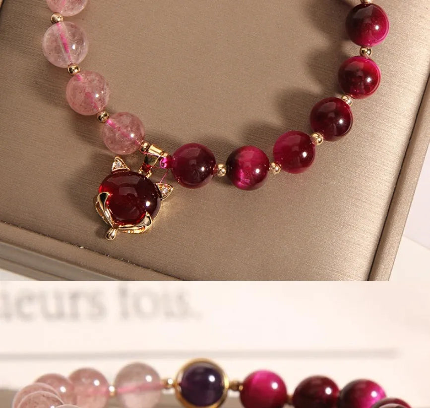 Simple strawberry crystal bead bracelet on a black elasticated rope for women