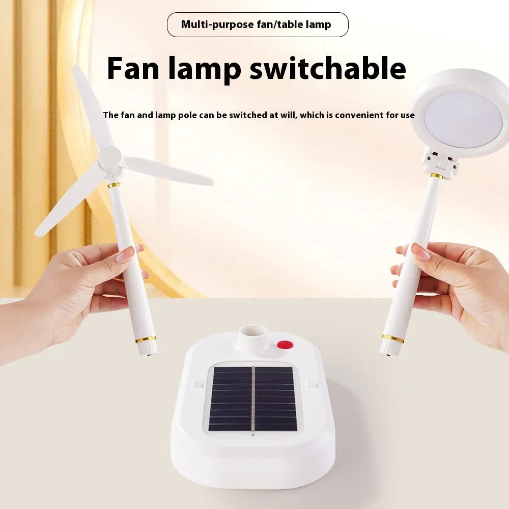 Ivory white solar-powered table fan with integrated LED study lamp on a desk.