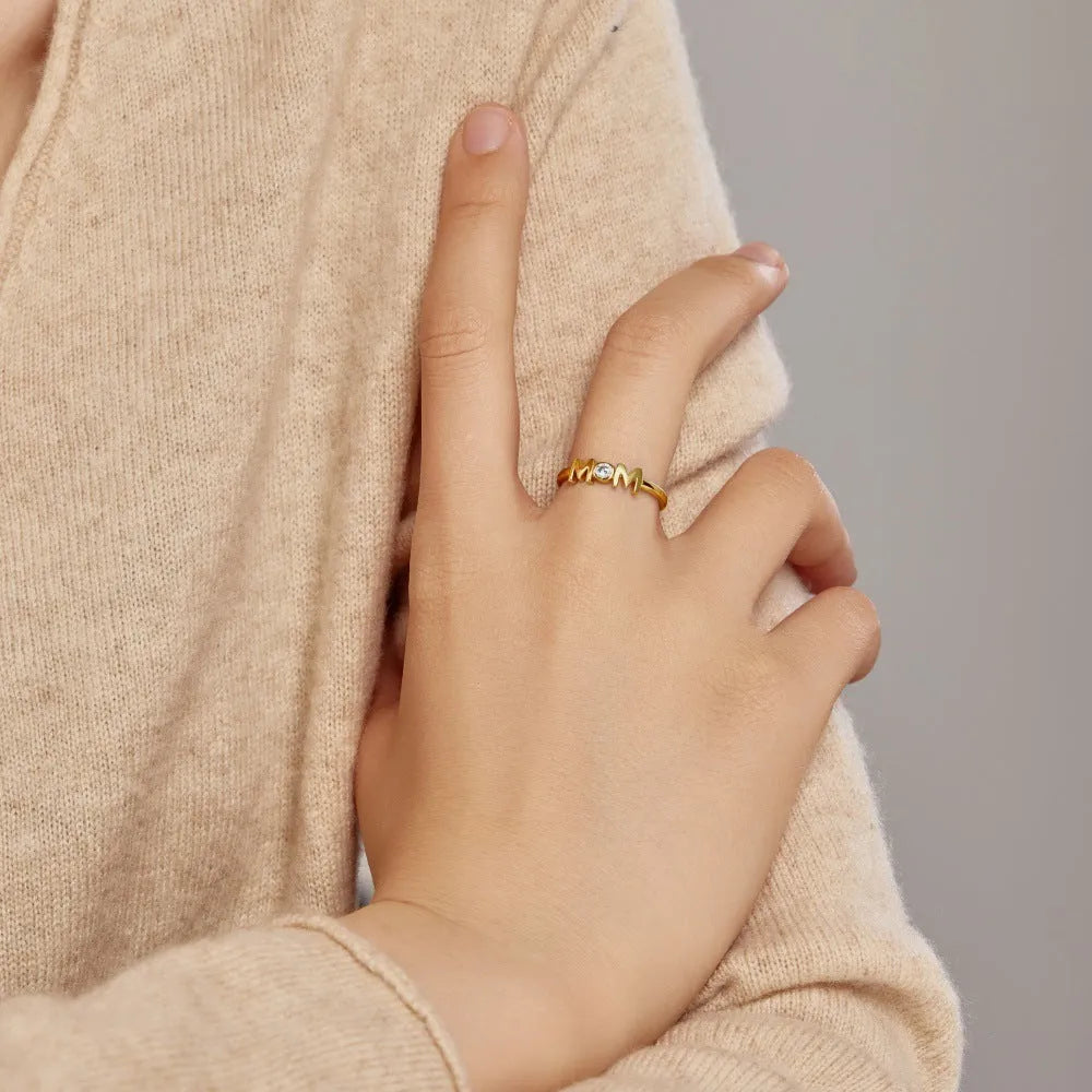 MOM Design silver personality ring with letter motif in gold finish