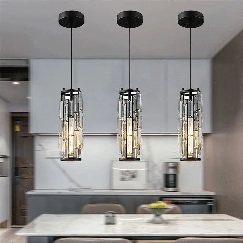 Single head industrial droplight ceiling pendant with crystal detail in black, chrome, or gold finish.