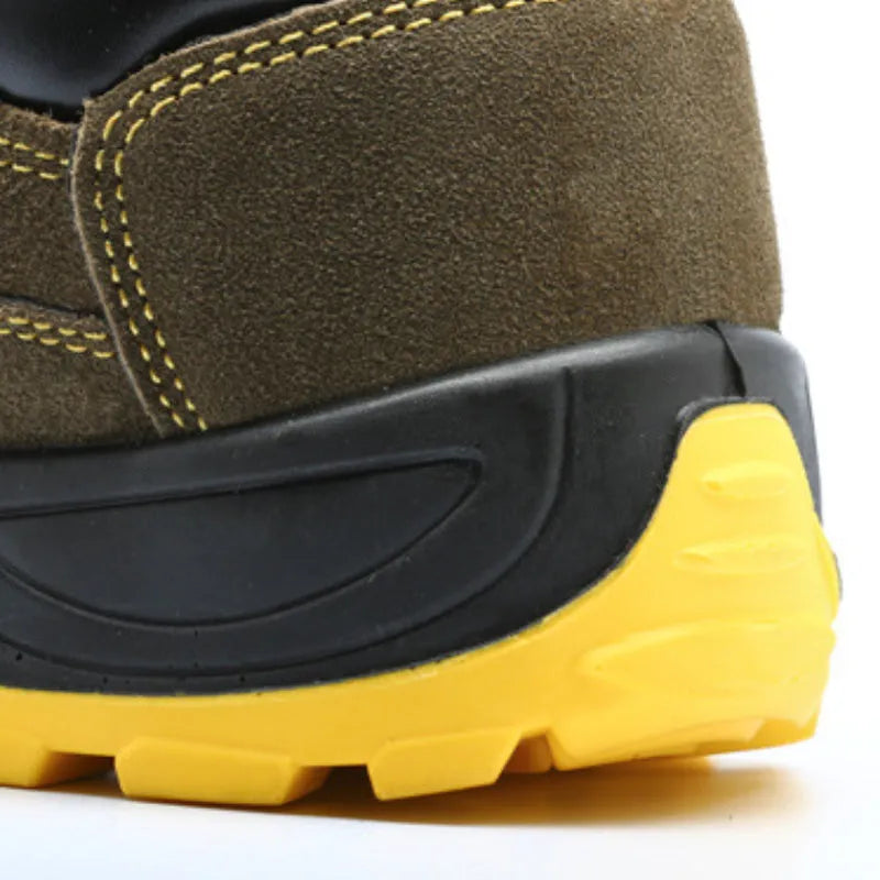 Bronze coloured low-cut leather safety boots with a steel toe cap and textured anti-skid sole.
