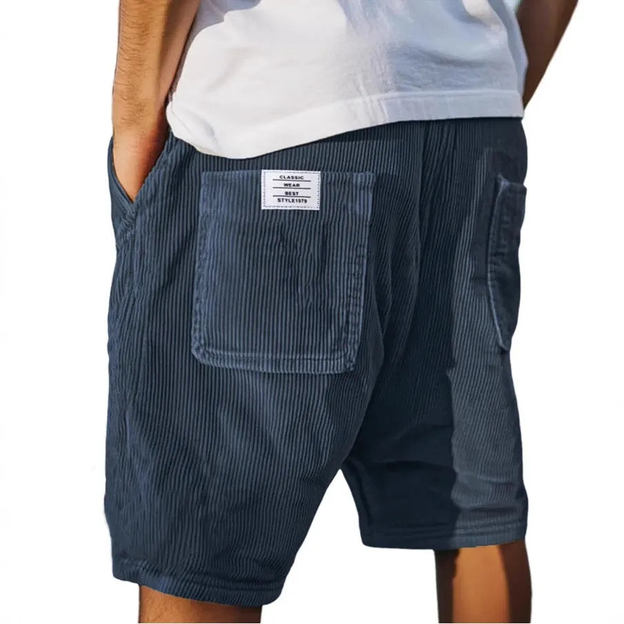 Men's straight-leg corduroy shorts with multiple pockets and embroidery detailing in grey colour