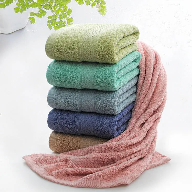 Thickened cotton blend bath and beach towel showing colour options including green, blue and brown variations