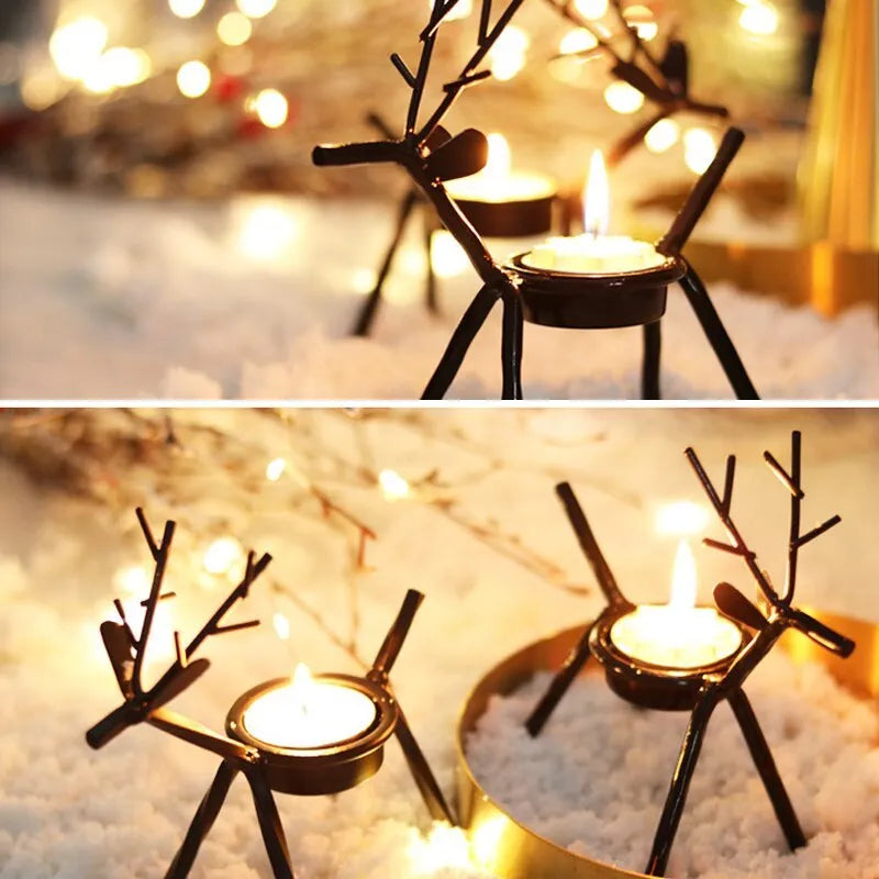 Black iron Christmas candlestick holder with decorative elk bracket design.