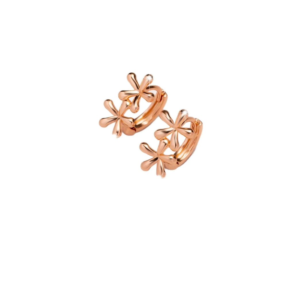 Rose gold waterdrop flower stud earrings with circular floral design on a white background.