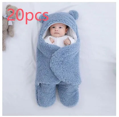 Cotton blend baby quilted sleeping bag wrapper shown in light blue, with size and colour options displayed.