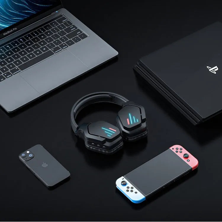 Luminous black wireless gaming headphones with head-mounted design showing ear cups and included 3.5mm cable