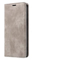Magnetic flip leather phone case for iPhone shown closed, displaying the lake green colour and secure front flap.