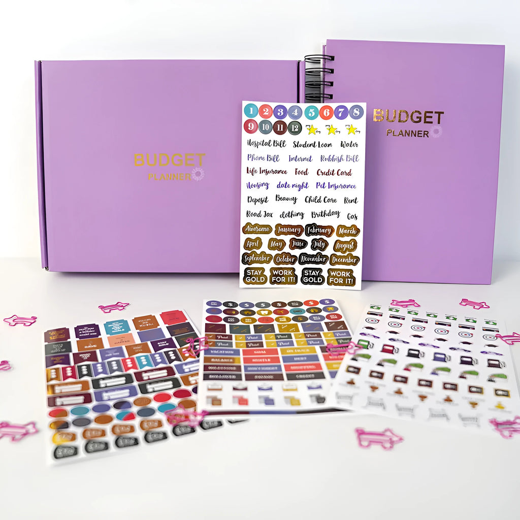 Purple A4 coil notebook for financial planning with stickers, pen, and paper clips