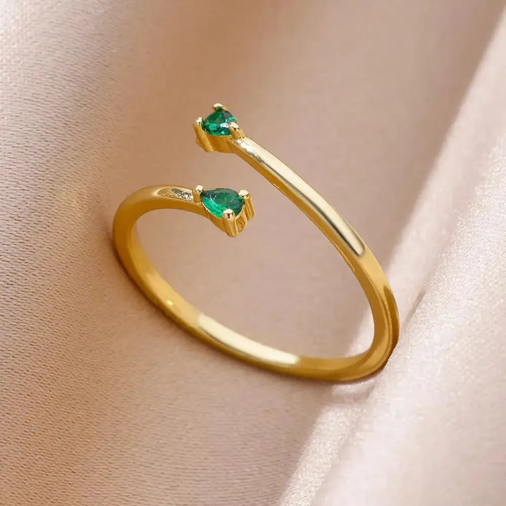 18K gold plated copper open mouth ring with synthetic zircon love emerald motif on white background