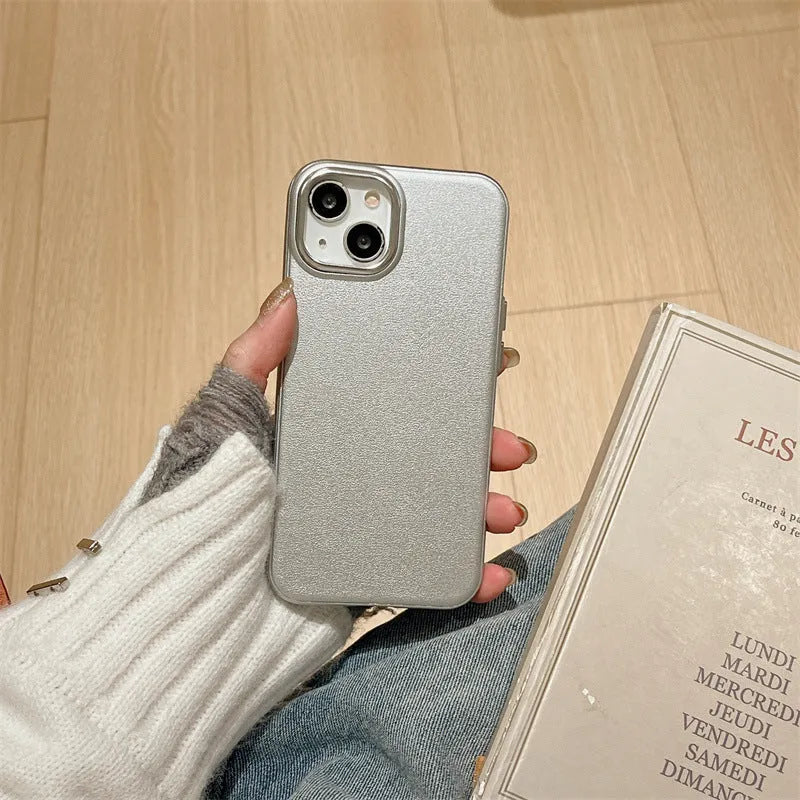 Imitation leather phone case for iPhone 15 Pro Max in solid black colour with embossed texture and protective edge