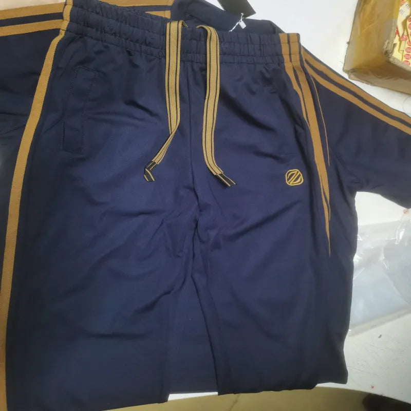 Men's blue polyester sports suit set with short sleeves showing top and pants