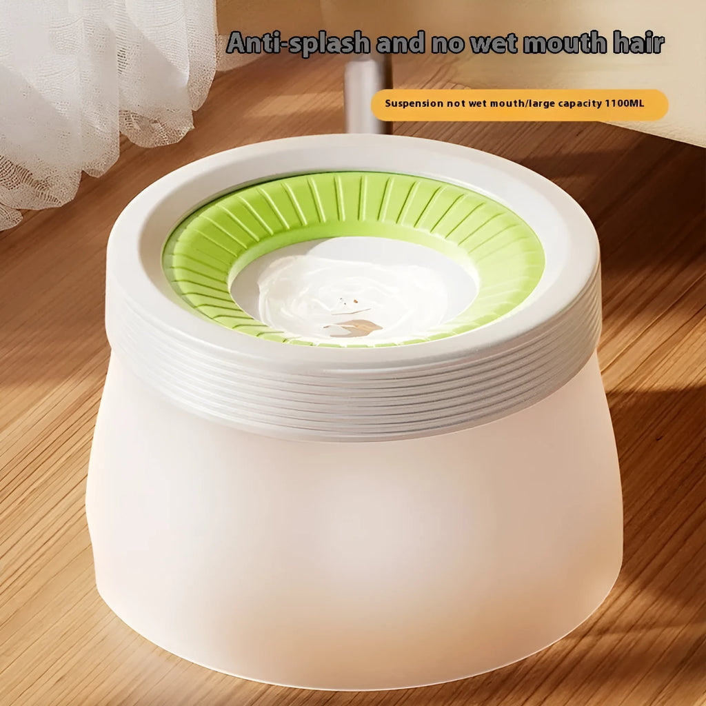 Green pet suspension water bowl for dogs and cats on a matching plate.