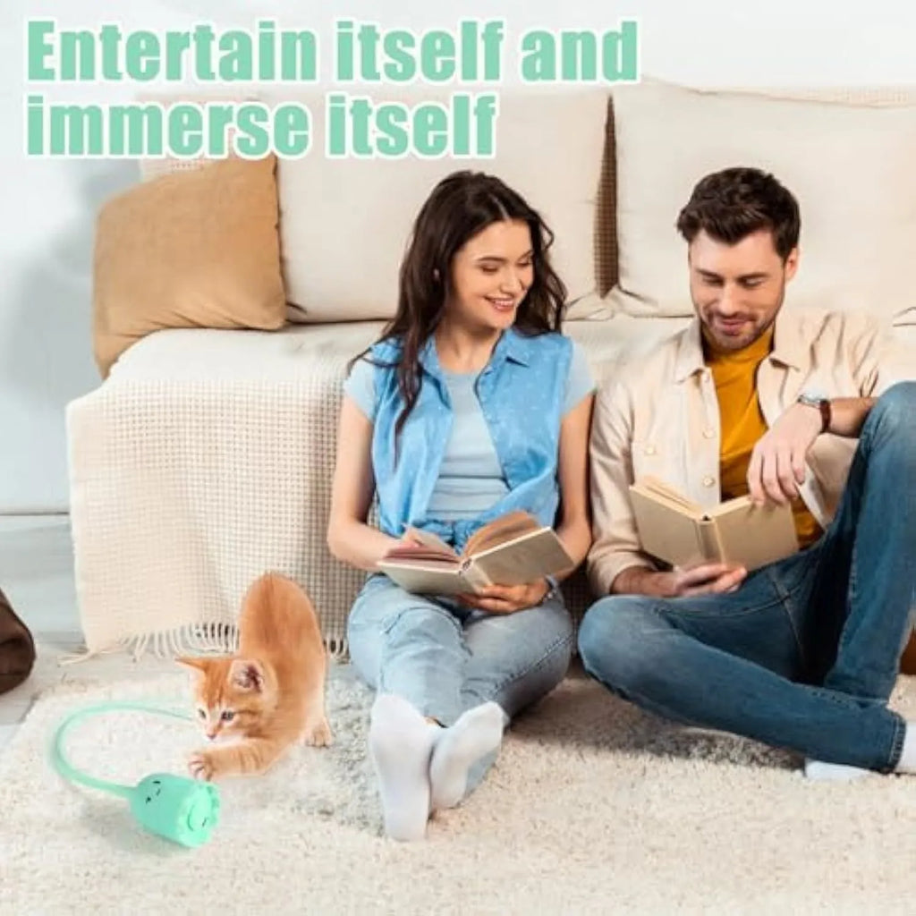 Green interactive cat toy with electronic wand and swinging silicone tails for indoor cats