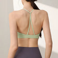 Women's nylon sports vest with fixed double shoulder straps in various colours for running and workout activities