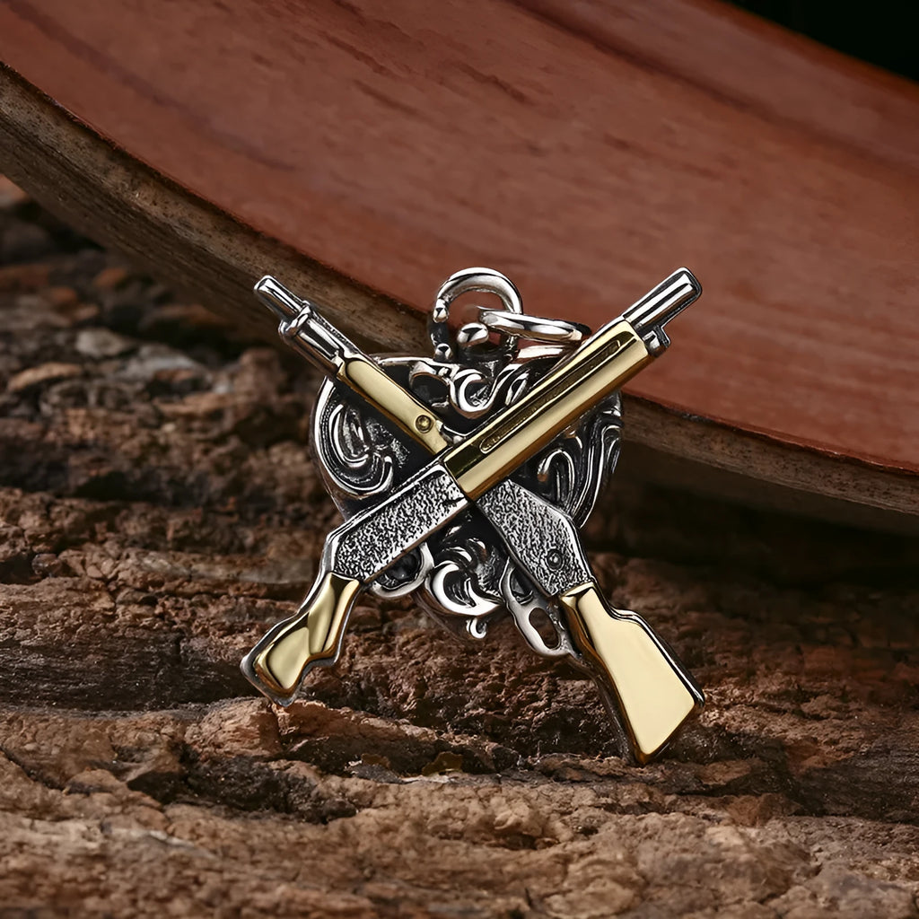 925 sterling silver pendant with dual gun heart-shaped design, 34 by 31 millimetres, silver colour