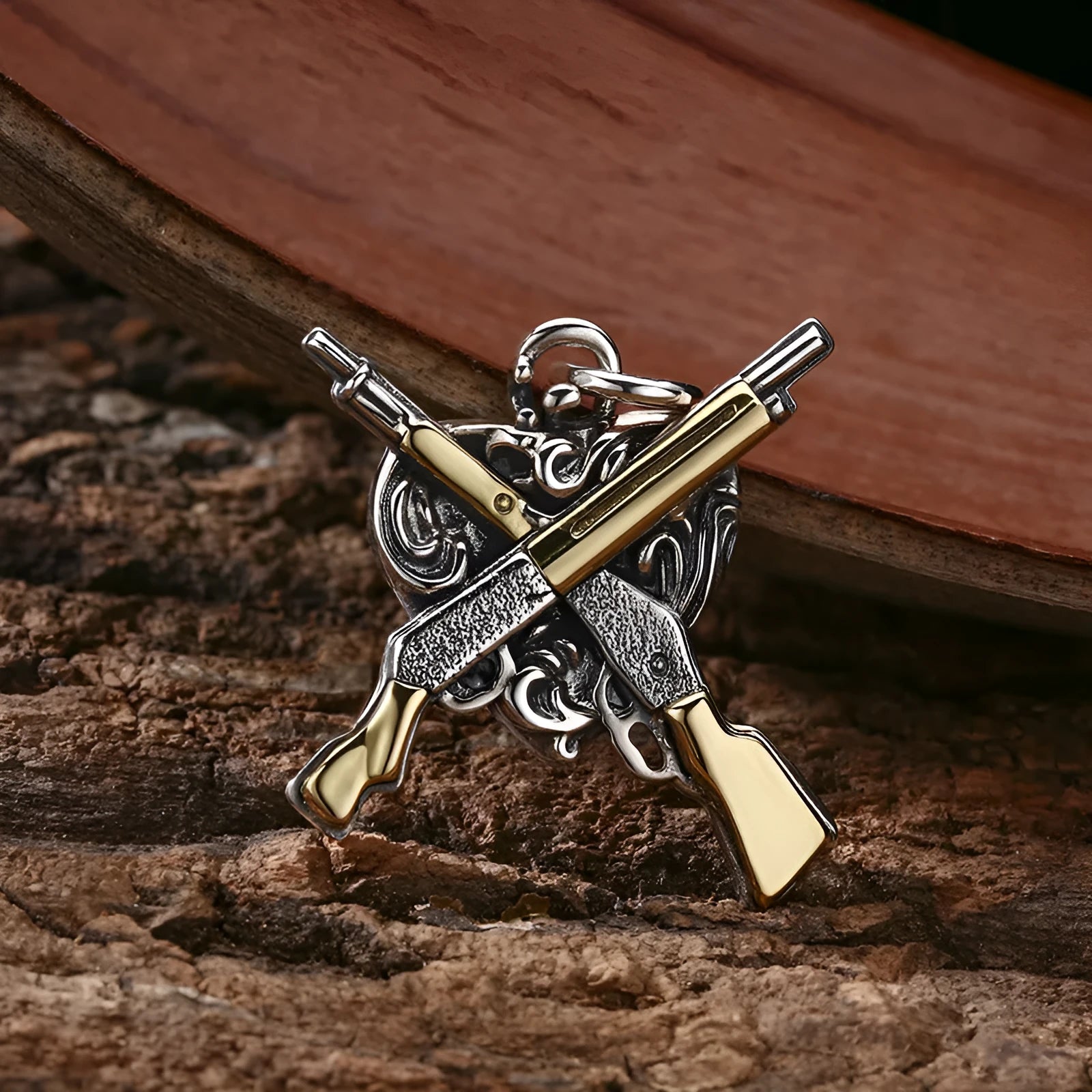925 sterling silver pendant with dual gun heart-shaped design, 34 by 31 millimetres, silver colour