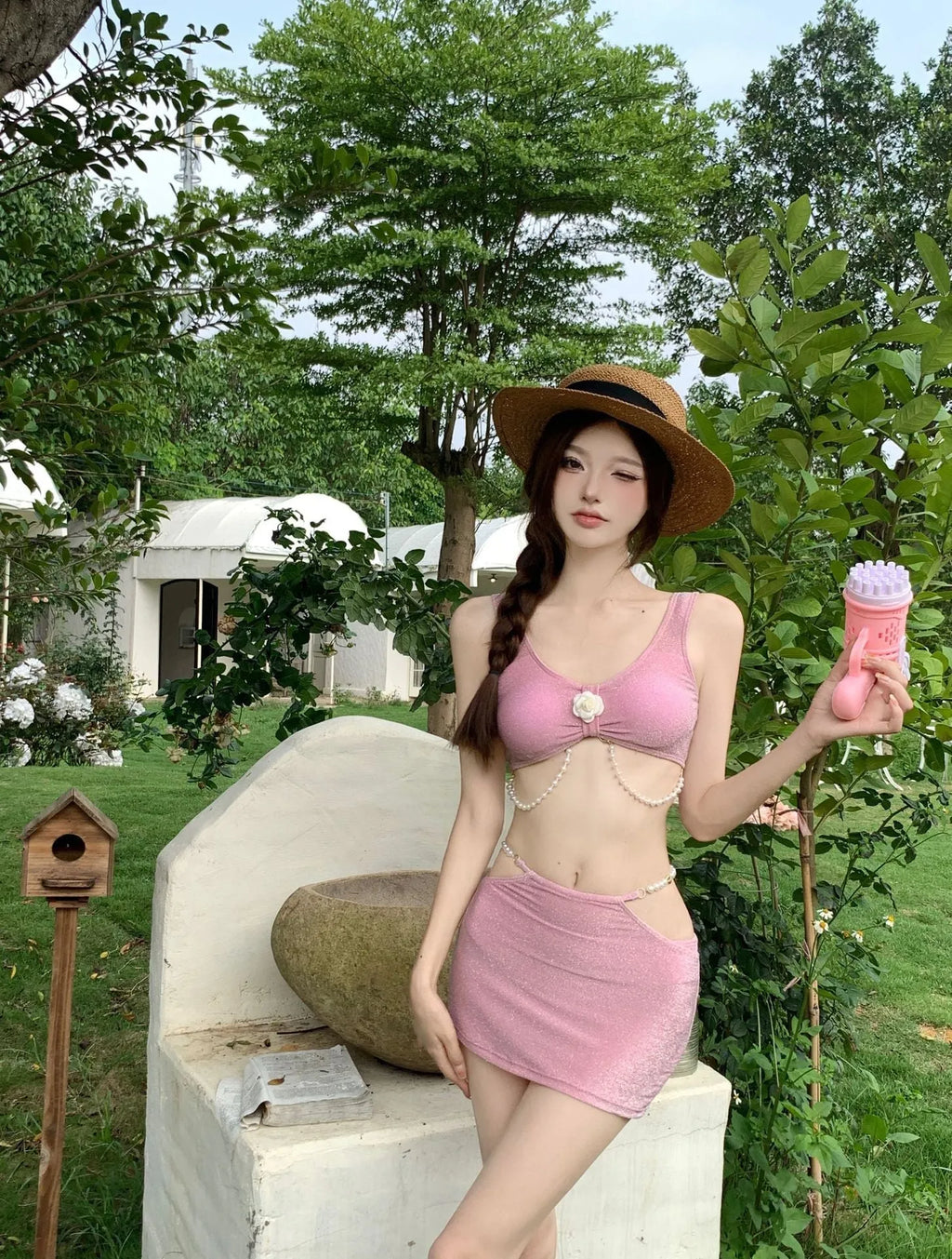 Women's three-piece polyester bikini set in pink or black with sleeveless briefs style for swimming and hot springs