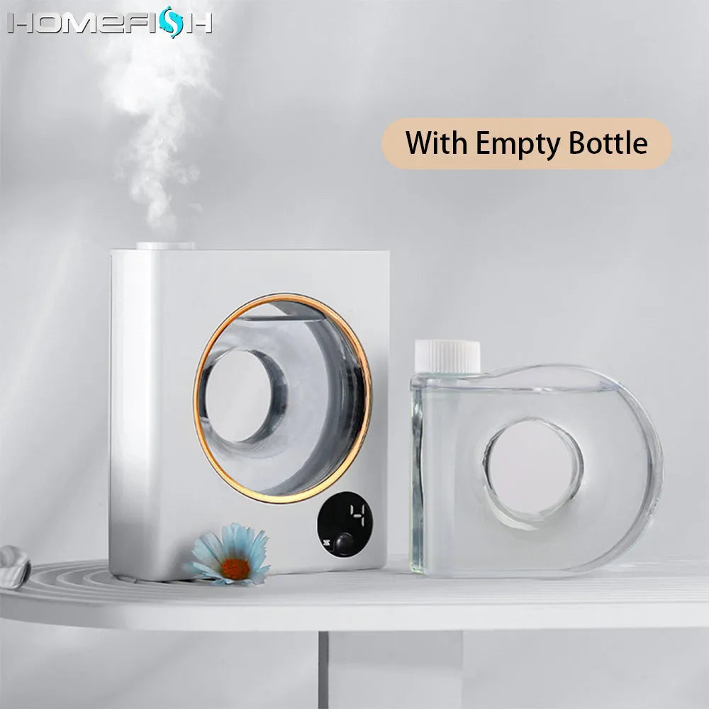Small white wall-mounted automatic aromatherapy machine and essential oil diffuser.