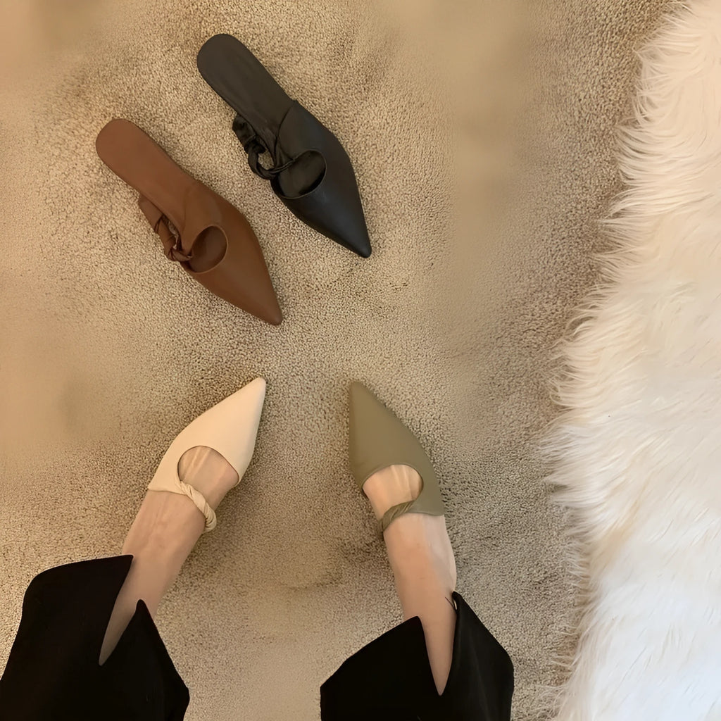 Women's leather-lined semi-toe box slippers with spring design and rubber sole in four colour options