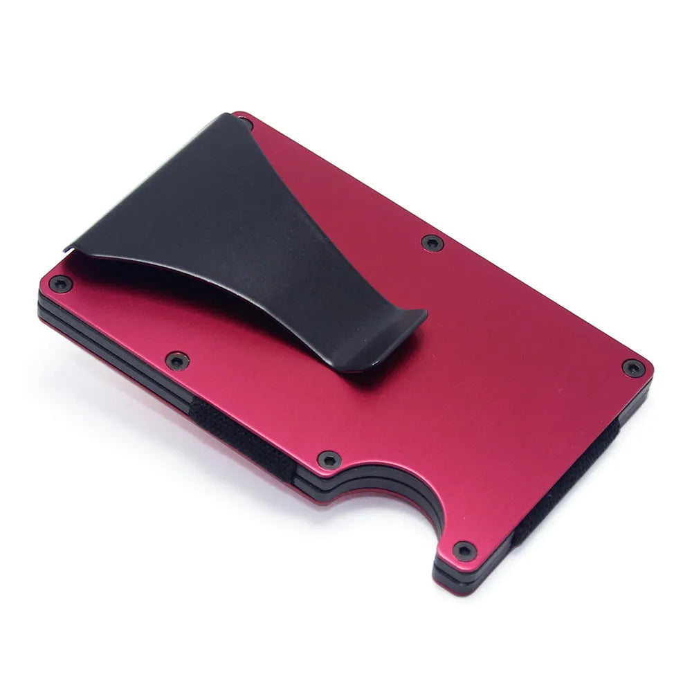 Geometric aluminium and carbon fibre card holder in multiple colours on a table, showing slim 8mm profile.