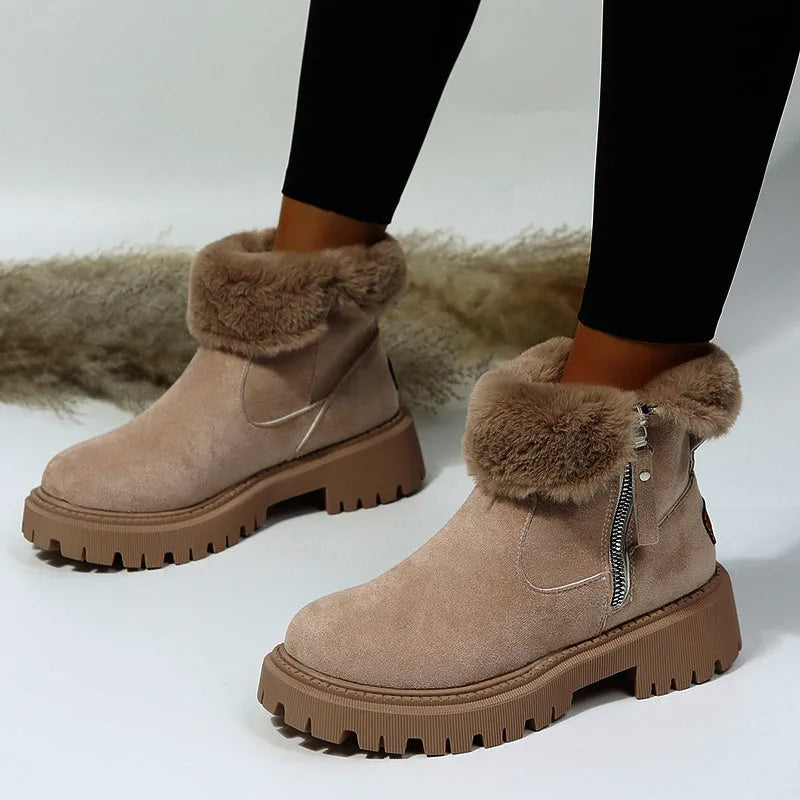 Women's black thick plush snow boots with side zipper and faux suede upper on a non-slip rubber sole.