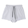 Men's black quick-drying nylon sports shorts on a mid-waist, shown from the front.
