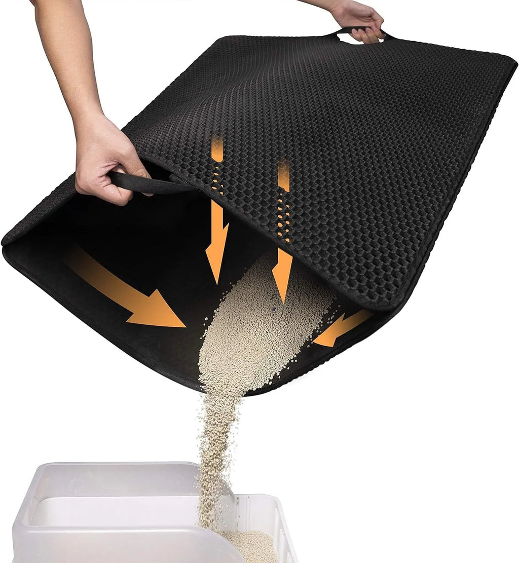 Black honeycomb double layer cat litter mat with non-slip bottom placed near litter box