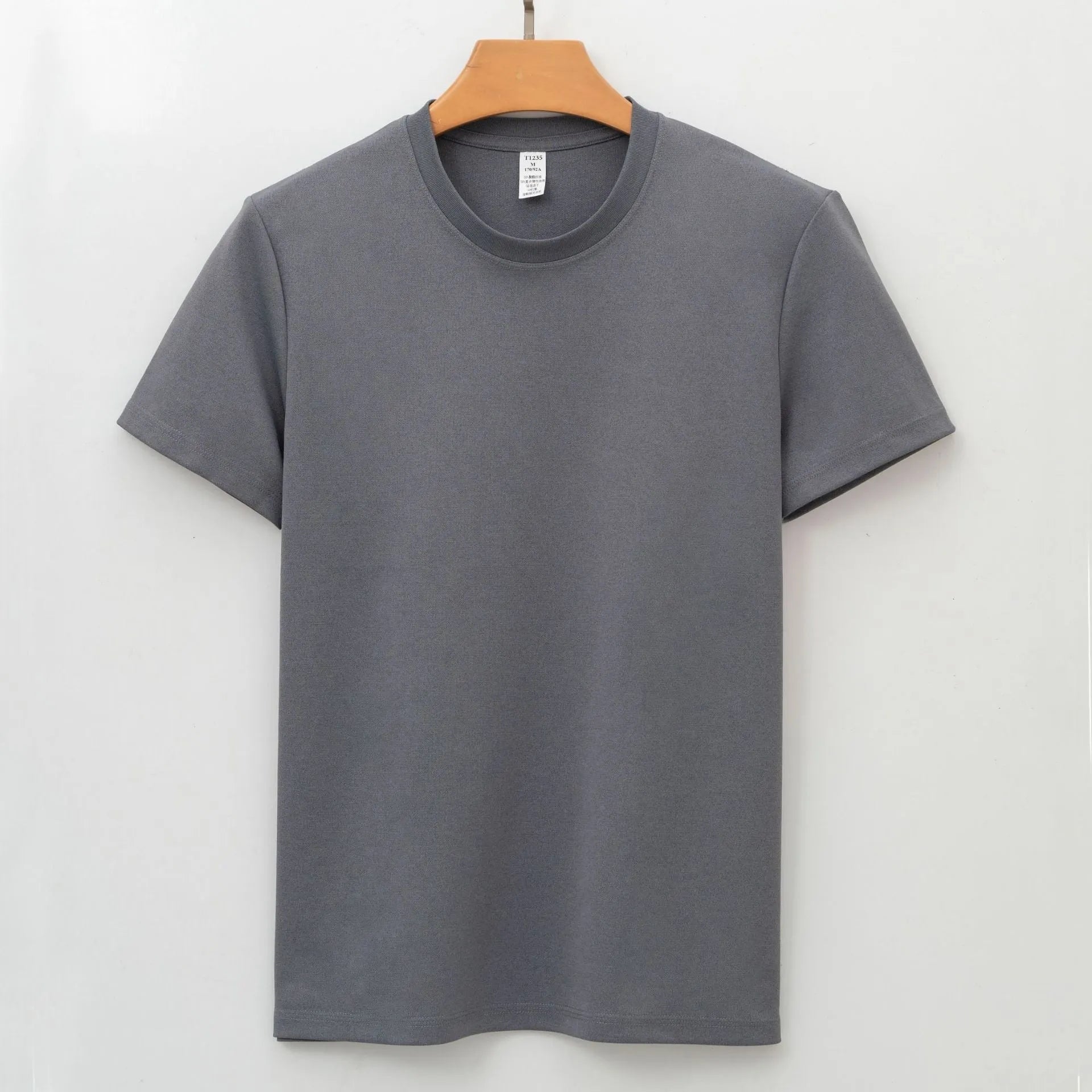 Men's solid colour antibacterial quick-dry short sleeve t-shirt on a hanger, straight cut style.
